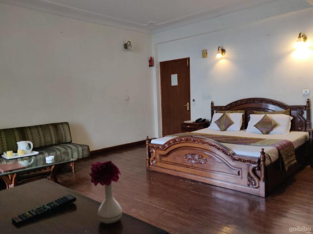 Hotel Blossom Shimla Bagian luar foto